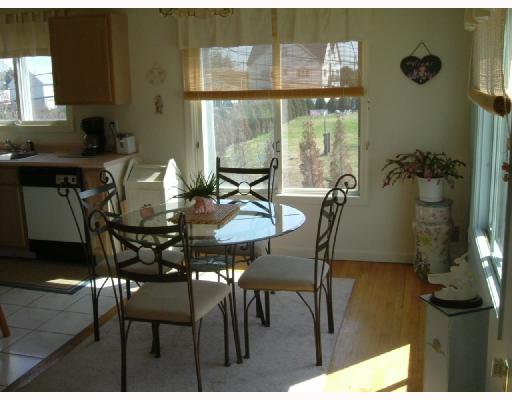 49 Foster Street Warwick, RI 02889 - Photo 4 of 8 Dining Room. Open dining room to living room and entertaining deck.