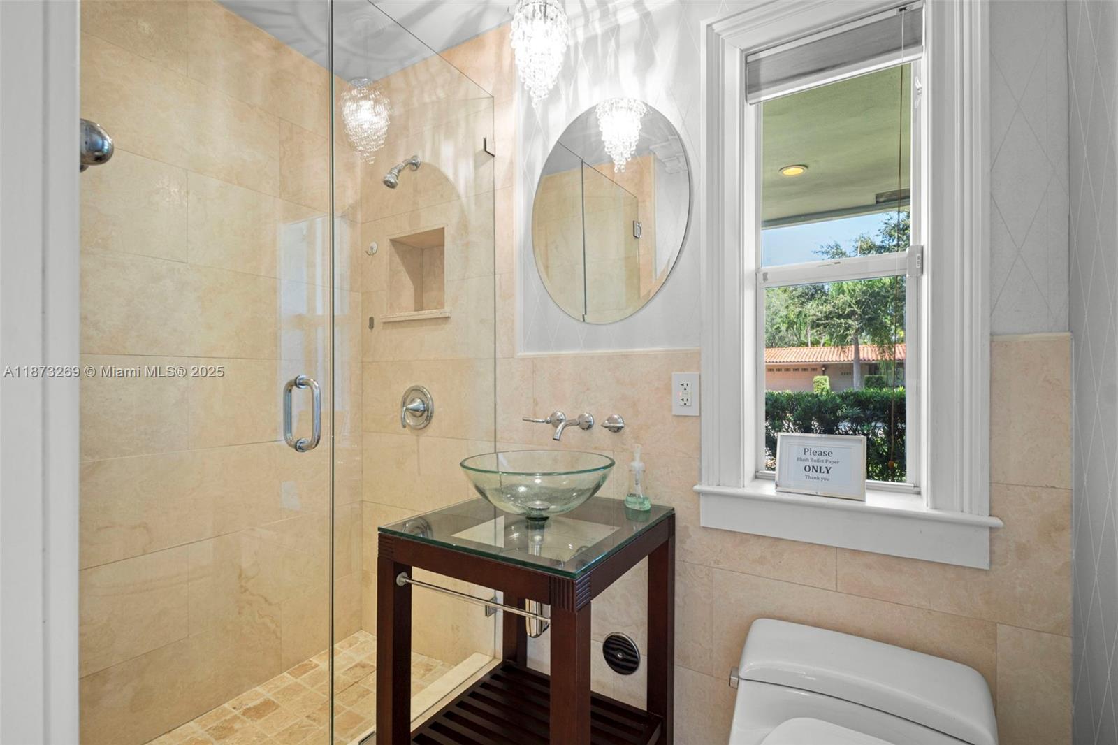 8260 Southwest 95th Street Miami, FL 33156 - Photo 12 of 50 a bathroom with a toilet a sink and a mirror