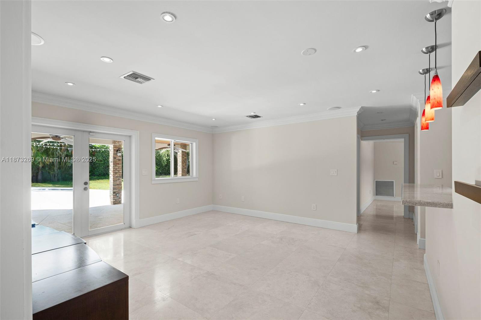 8260 Southwest 95th Street Miami, FL 33156 - Photo 14 of 50 a view of an empty room with a window