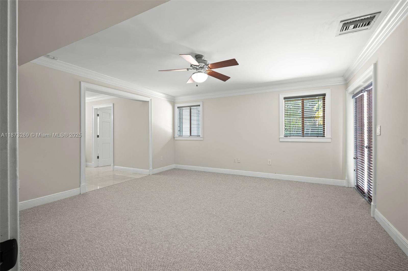 8260 Southwest 95th Street Miami, FL 33156 - Photo 18 of 50 a view of an empty room with a window