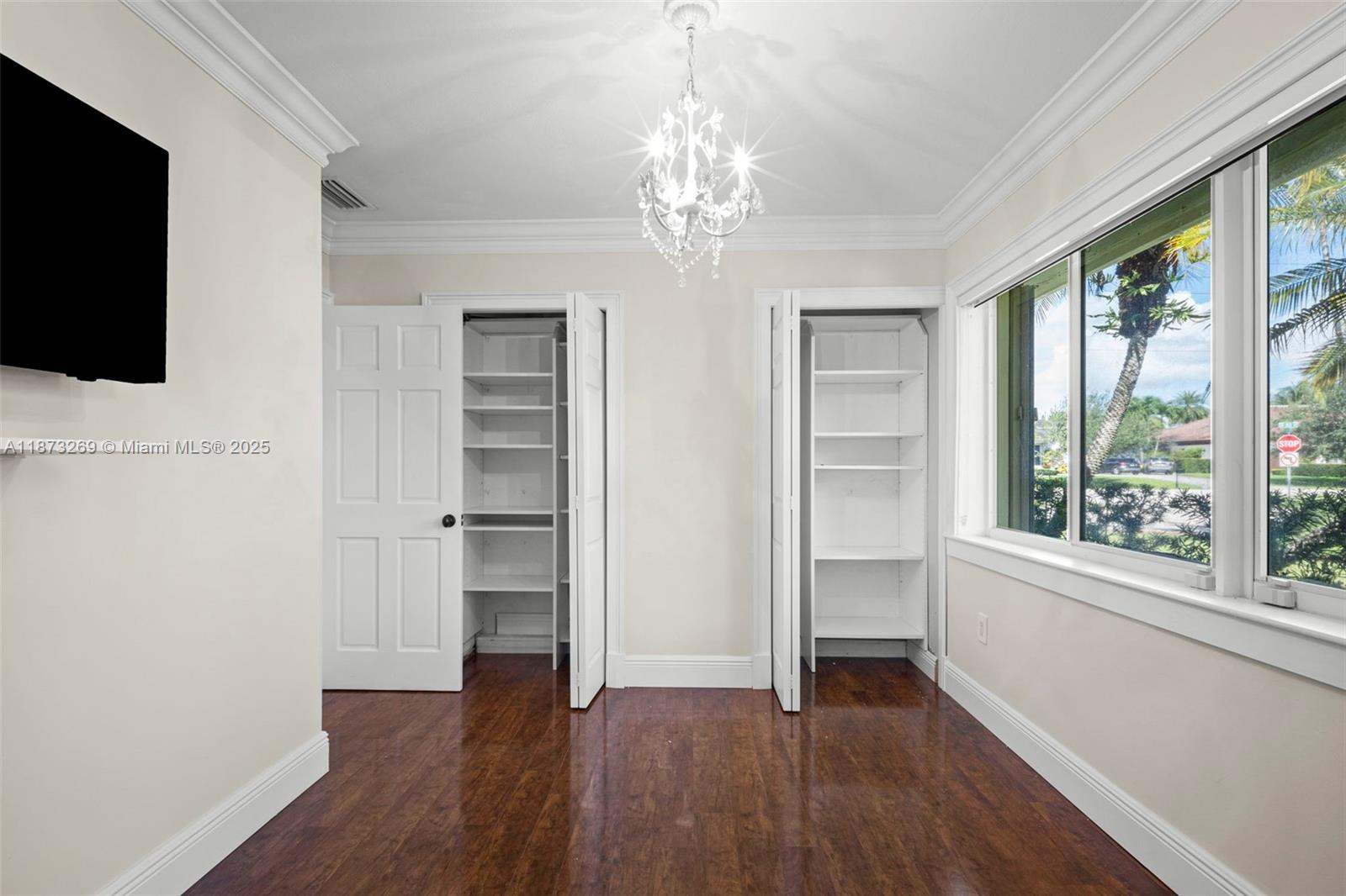 8260 Southwest 95th Street Miami, FL 33156 - Photo 31 of 50 a view of livingroom with hardwood floor and window