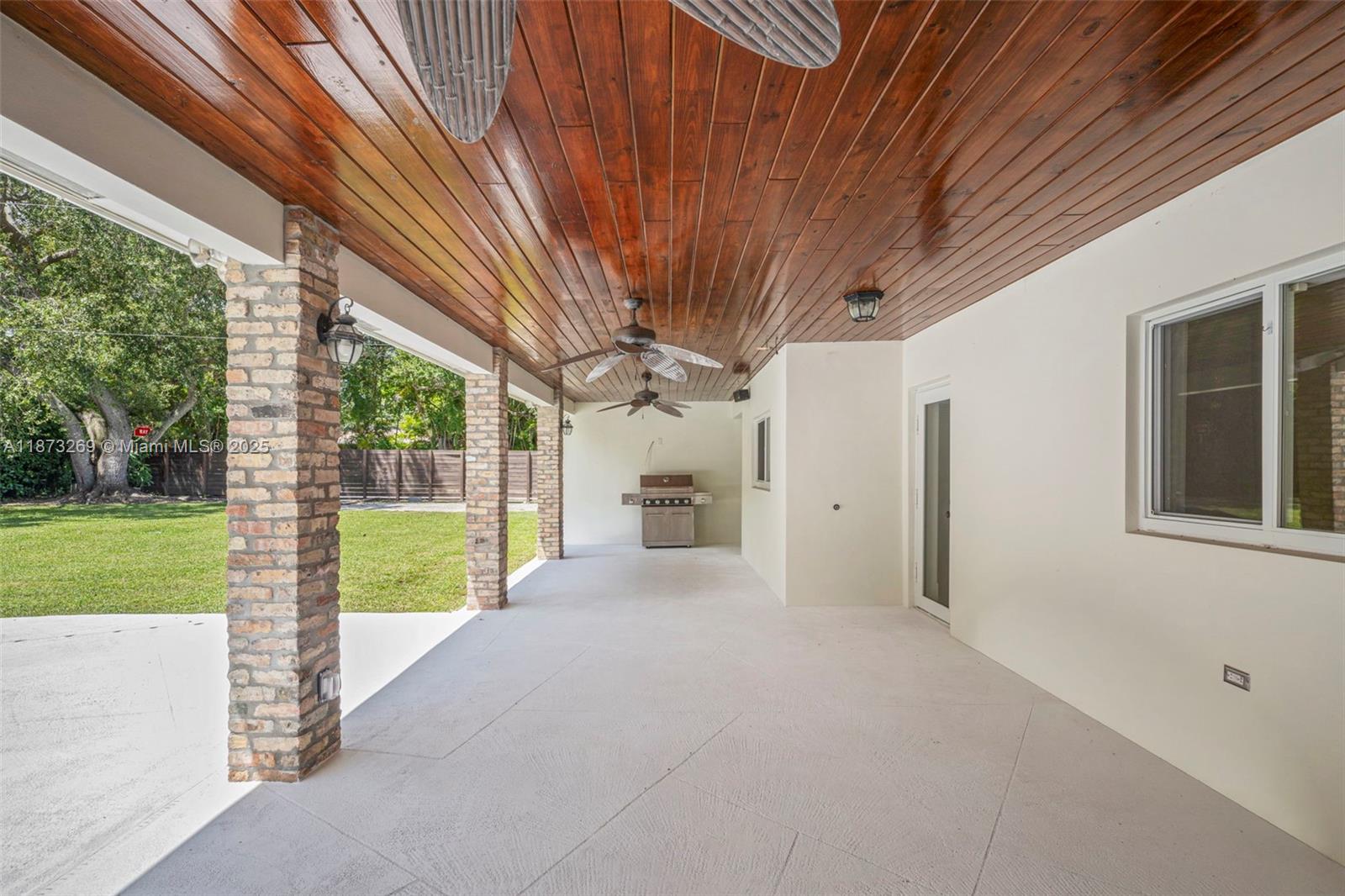 8260 Southwest 95th Street Miami, FL 33156 - Photo 36 of 50 a view of a house with a big yard and large tree