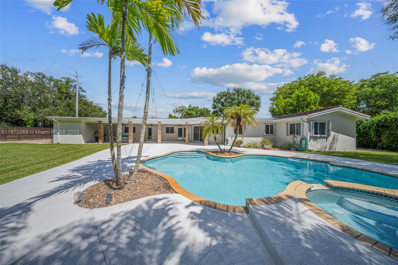 8260 Southwest 95th Street Miami, FL 33156 - Photo 39 of 50 a view of a house with swimming pool