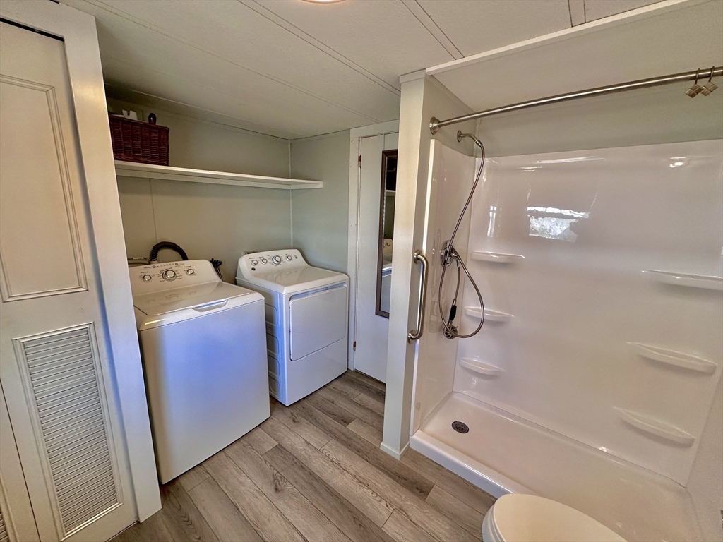 27 Windswept Road Wareham, MA 02576 - Photo 15 of 34 a bathroom with a shower a toilet and sink