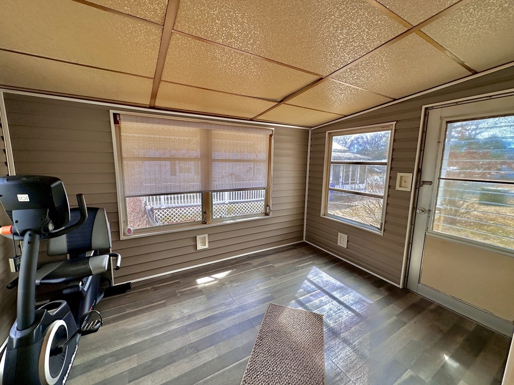 27 Windswept Road Wareham, MA 02576 - Photo 16 of 34 a view of workspace with wooden floor and windows