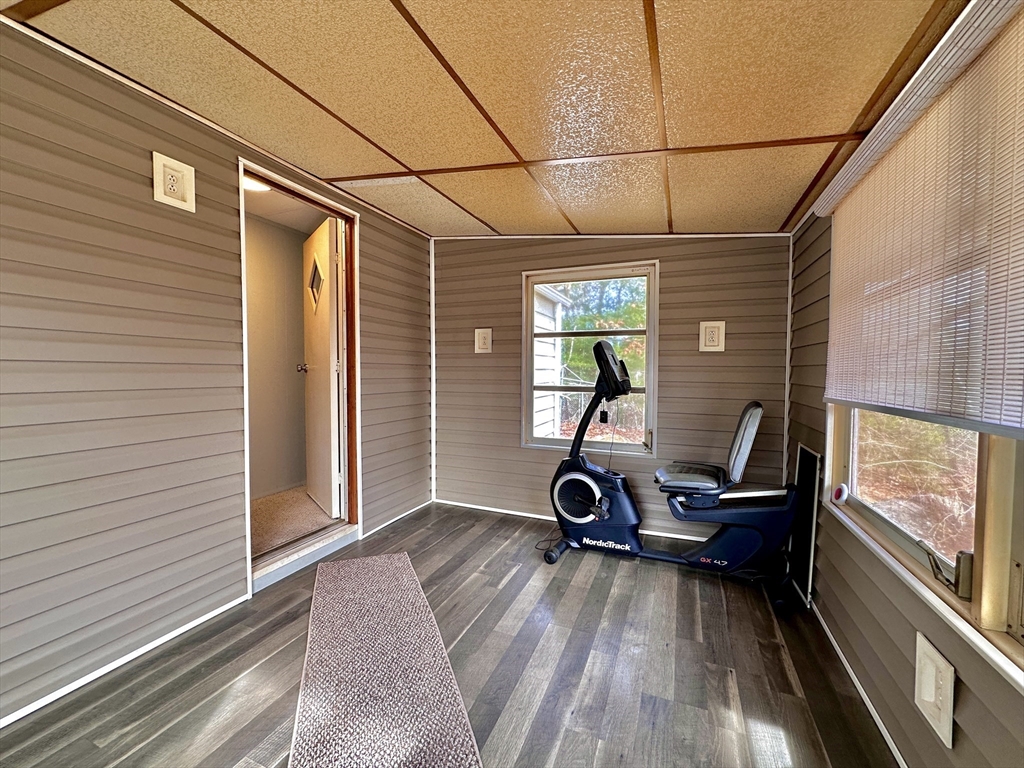 27 Windswept Road Wareham, MA 02576 - Photo 18 of 34 a view of a balcony with chair and a gate