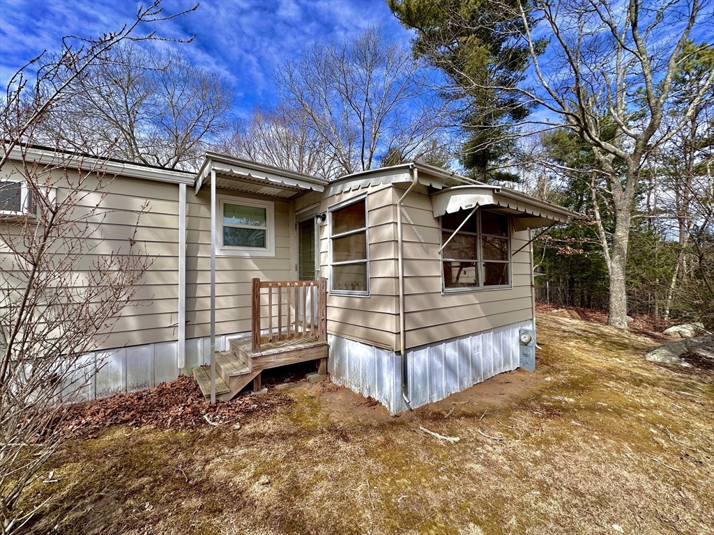 27 Windswept Road Wareham, MA 02576 - Photo 19 of 34 a view of a house with a yard