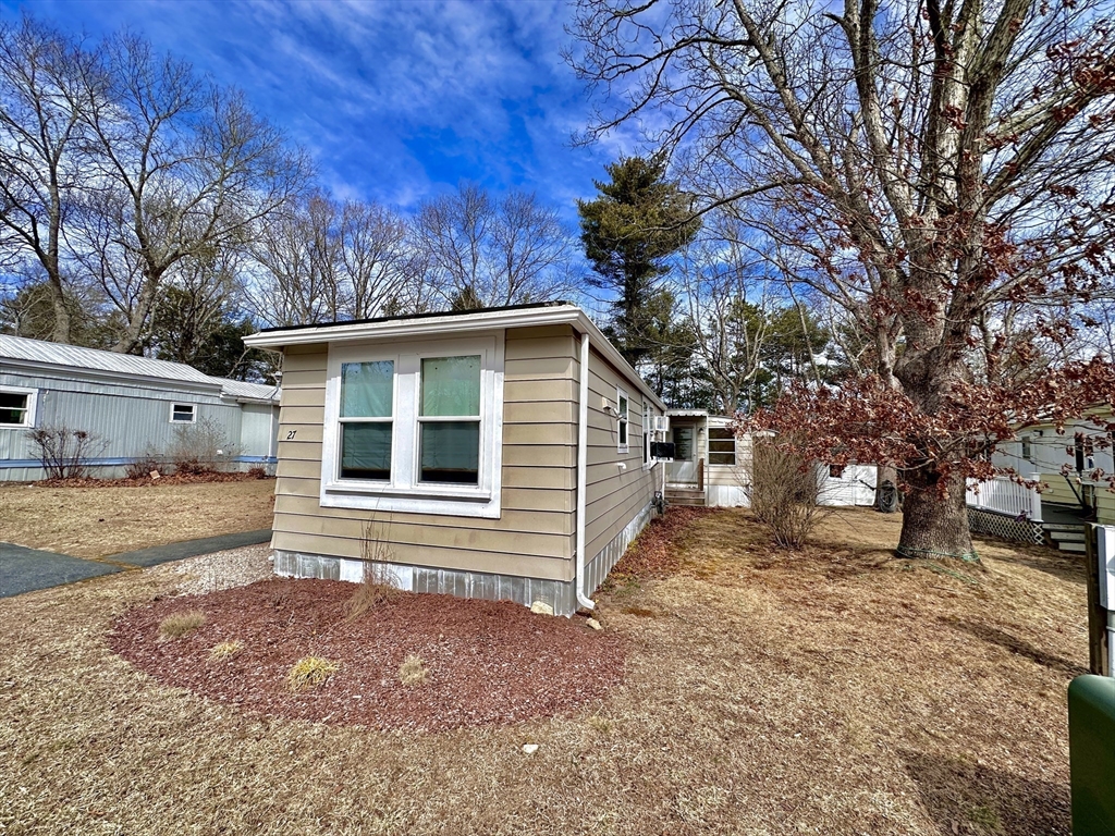 27 Windswept Road Wareham, MA 02576 - Photo 25 of 34 a view of a house with a yard covered in snow