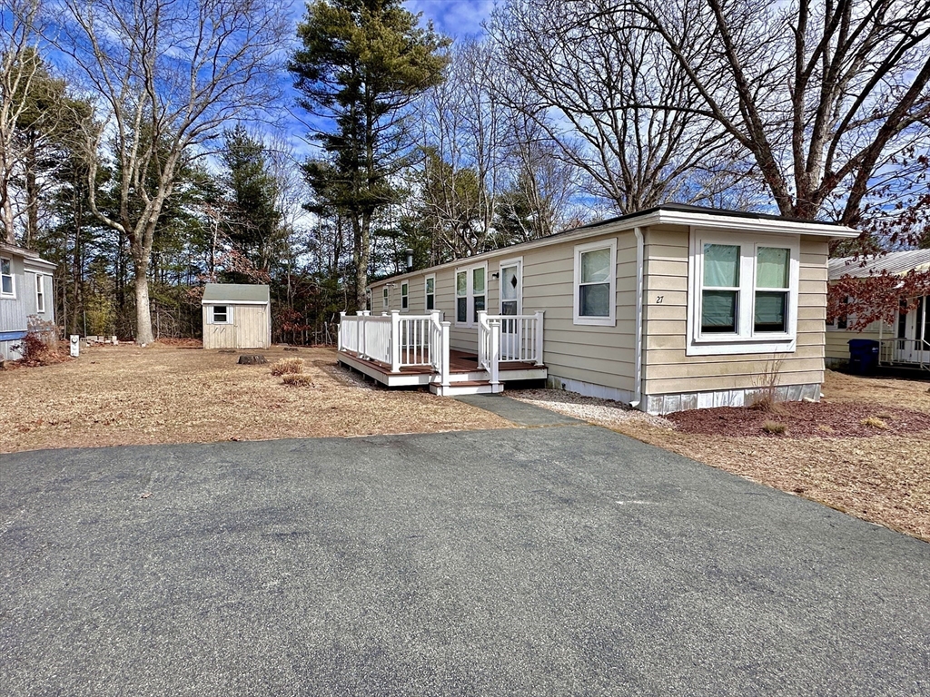27 Windswept Road Wareham, MA 02576 - Photo 26 of 34 a view of a house with a yard covered in snow