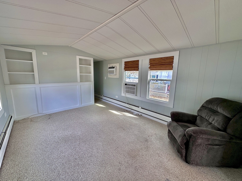 27 Windswept Road Wareham, MA 02576 - Photo 5 of 34 a living room with furniture and a window