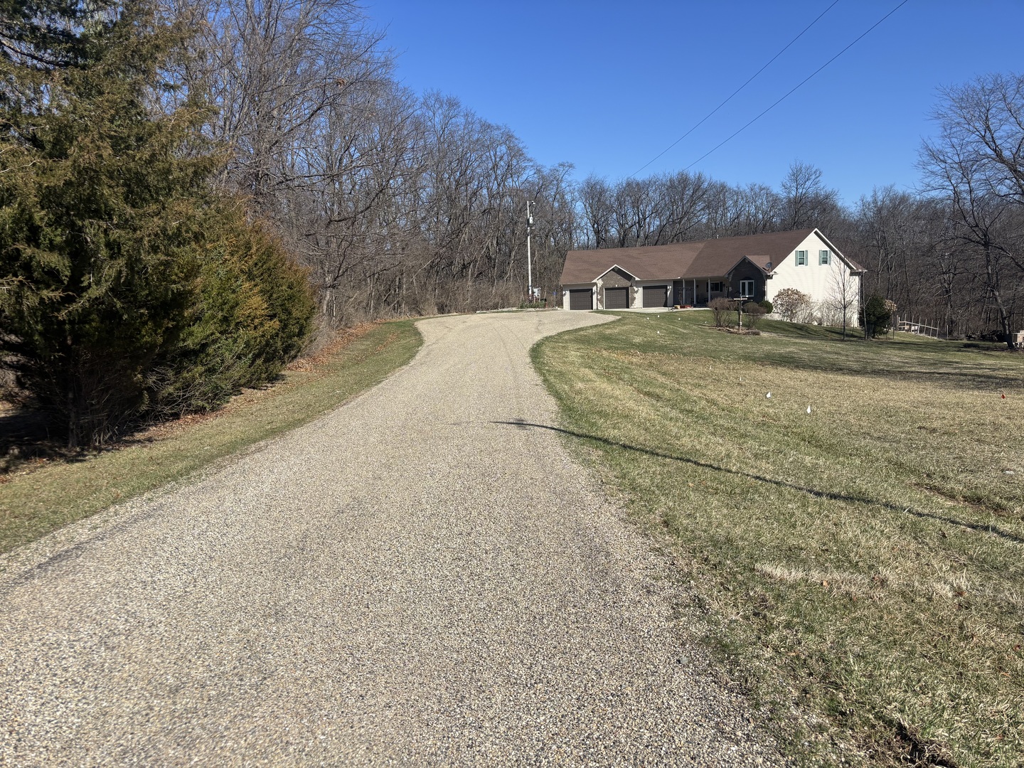 1050 Spring Mill Court Varna, IL 61375 - Photo 3 of 5 a view of a white house with a yard