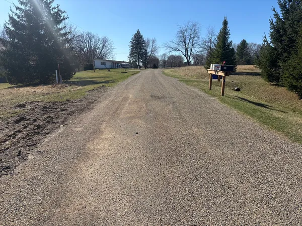 a view of a park with a houses
