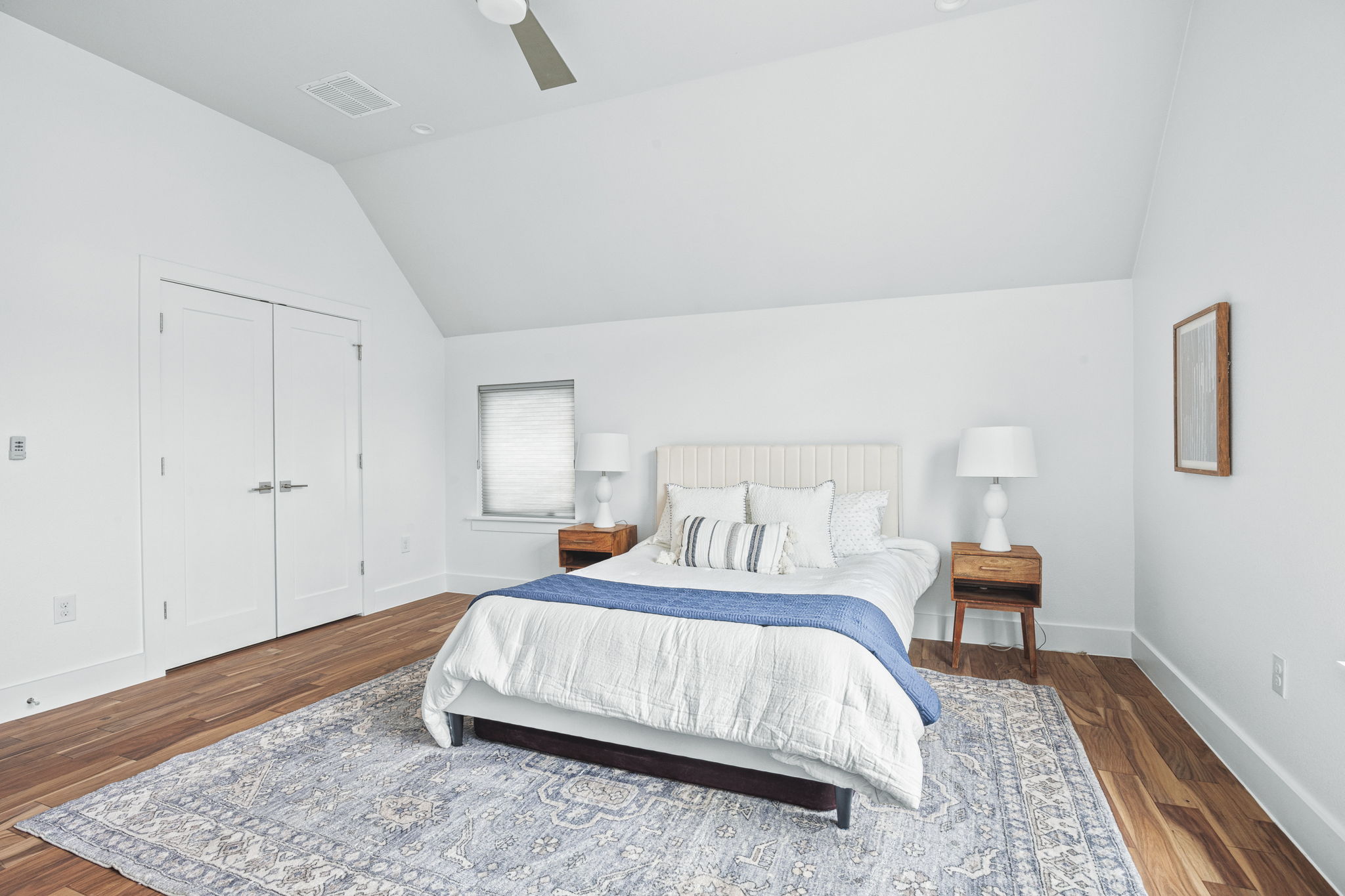 1218 Eleanor Street, Unit 1 Austin, TX 78721 - Photo 26 of 39 a bedroom with bed and window