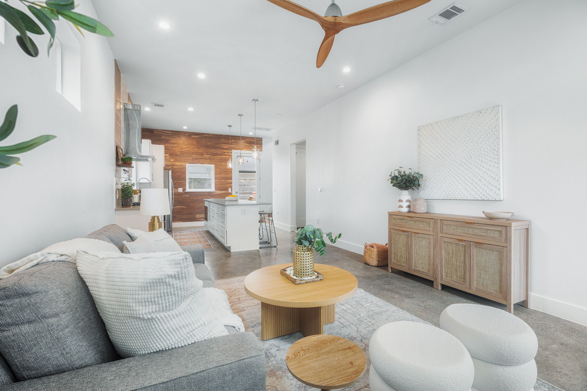 1218 Eleanor Street, Unit 1 Austin, TX 78721 - Photo 5 of 39 a living room with furniture and a large window