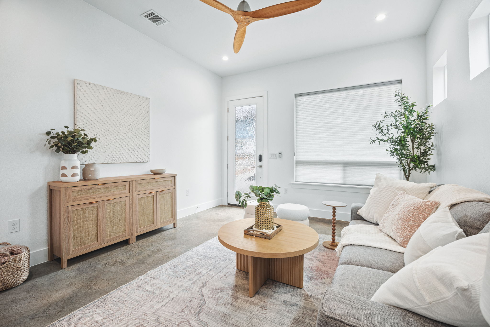1218 Eleanor Street, Unit 1 Austin, TX 78721 - Photo 7 of 39 a living room with furniture and a potted plant