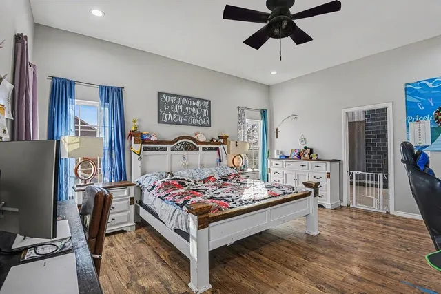 a bed room with furniture and a table