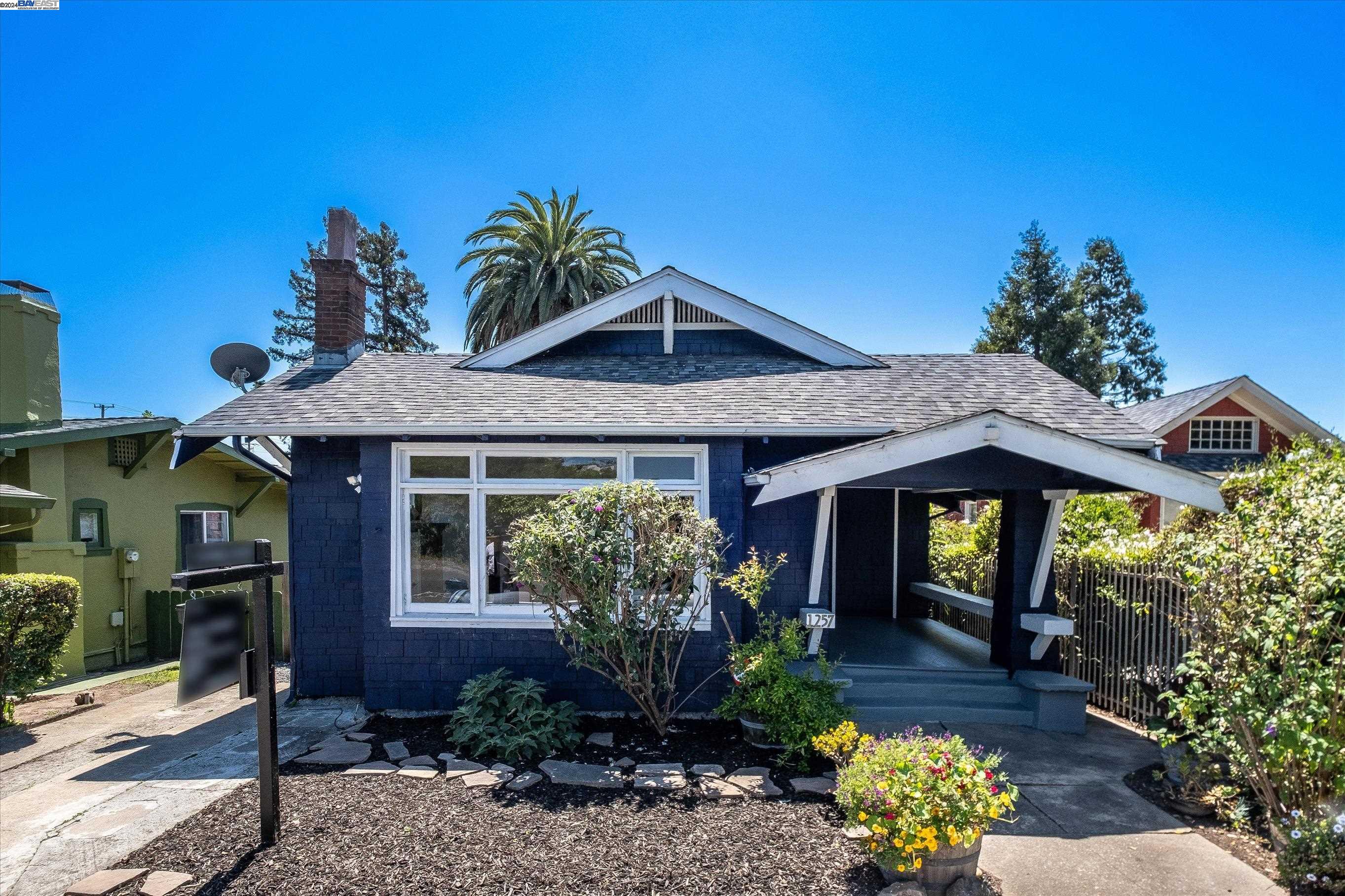 1257 MacArthur Boulevard Oakland, CA 94610 - Photo 1 of 1 a front view of a house with a yard