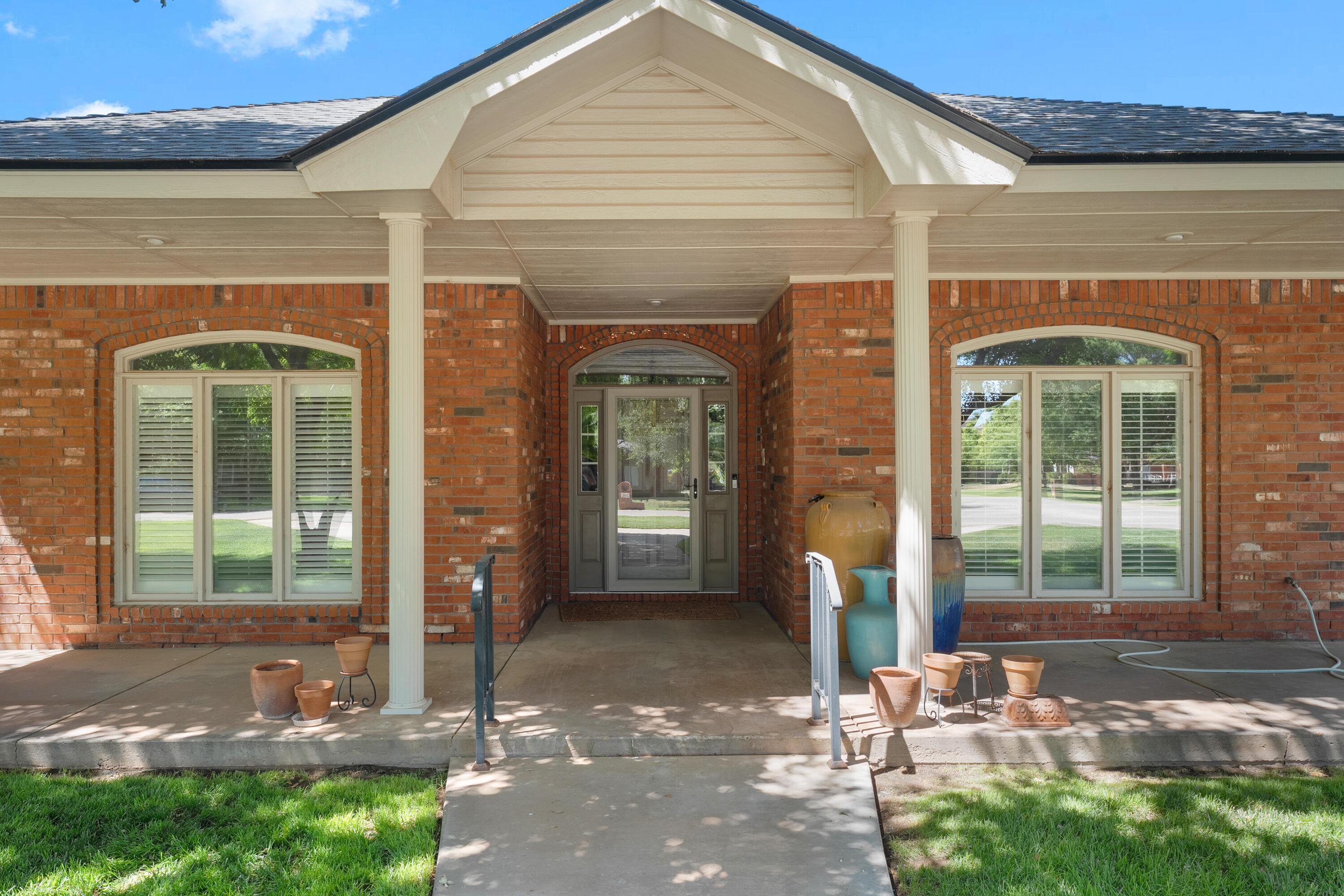 7402 95th Street Lubbock, TX 79424 - Photo 4 of 43 a front view of a house