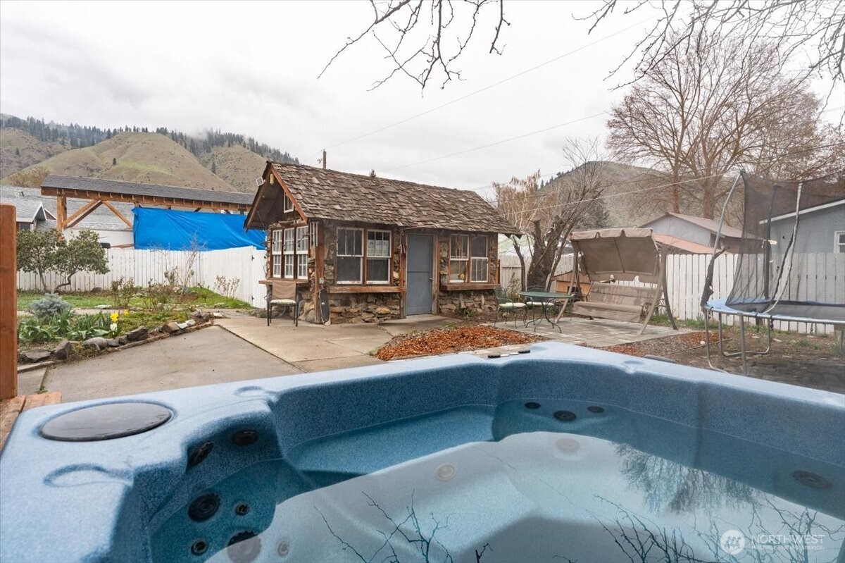 225 South Division Street Cashmere, WA 98815 - Photo 33 of 40 a swimming pool view with a outdoor seating