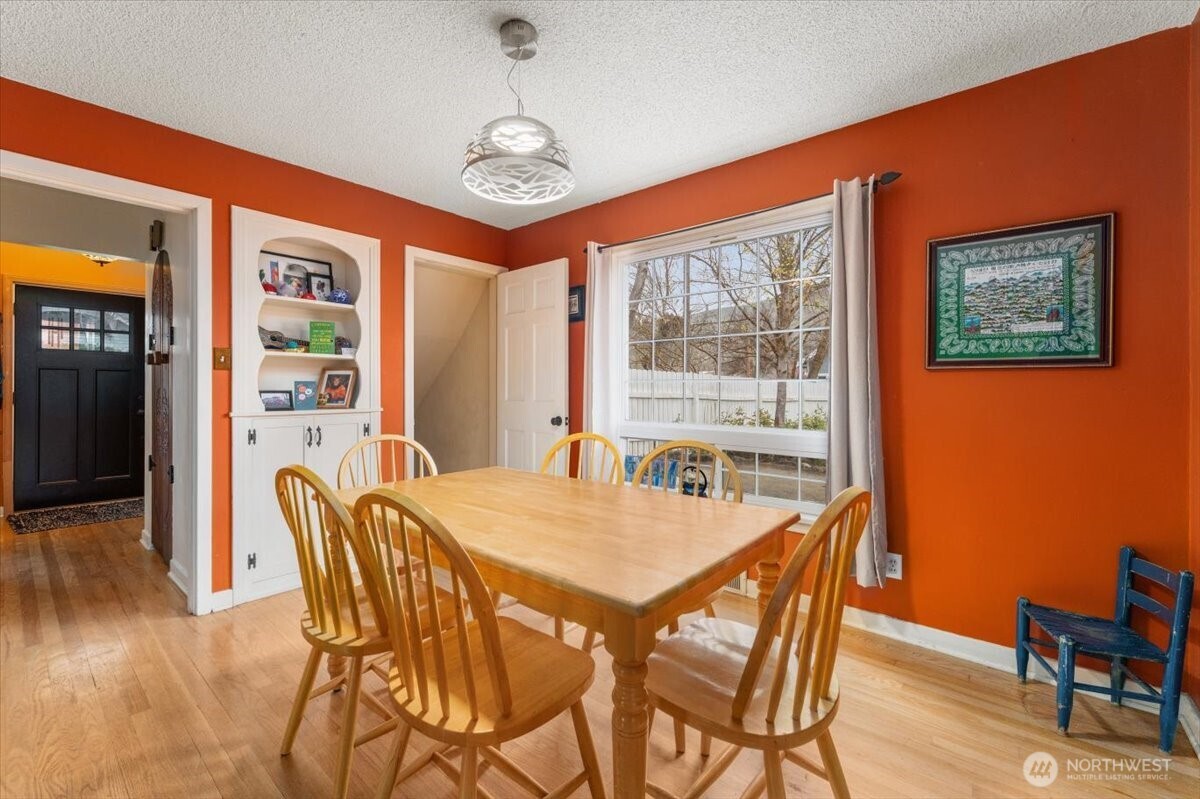 225 South Division Street Cashmere, WA 98815 - Photo 7 of 40 a view of a dining room with furniture window and wooden floor