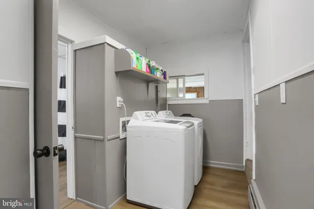 a utility room with dryer and washer