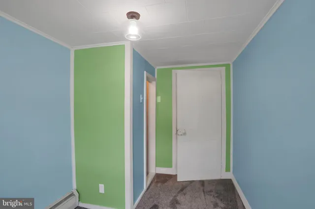 a view of hallway with closet