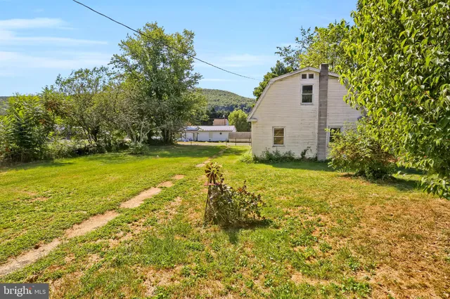 a house view with a garden space