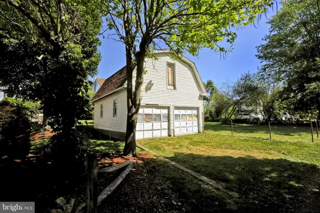 a house view with garden space