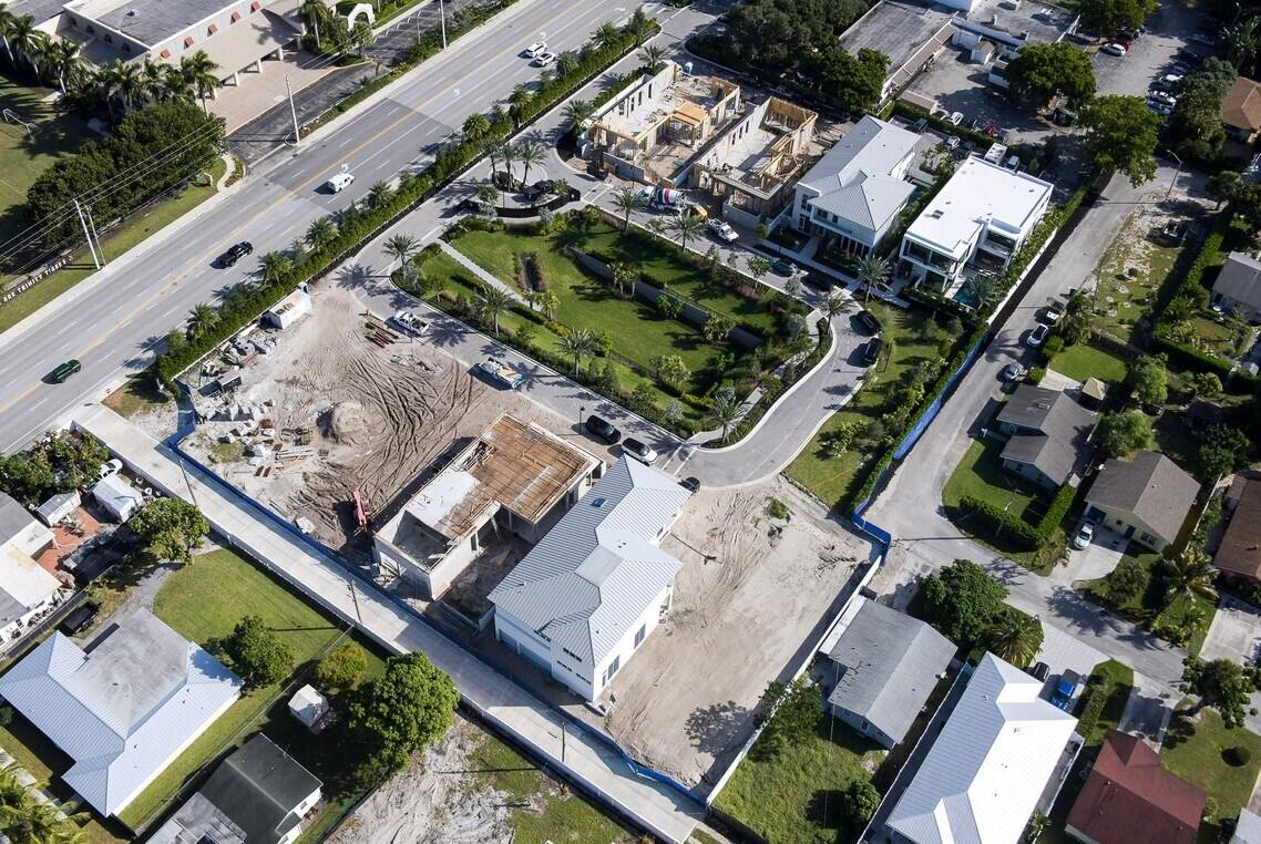 300 Grove Place Delray Beach, FL 33444 - Photo 14 of 23 an aerial view of a house with a yard
