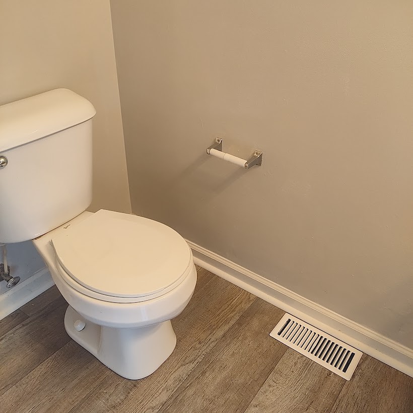 110 Mason Street Portland, TN 37148 - Photo 12 of 24 a white toilet sitting next to a white wall