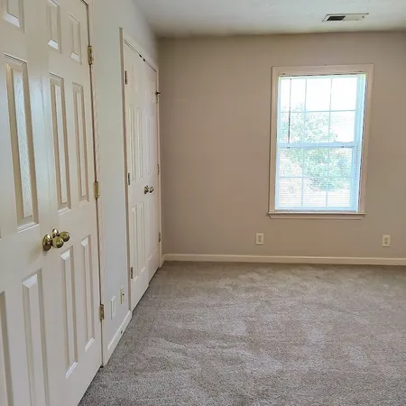 an empty room with windows