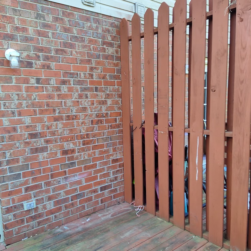 110 Mason Street Portland, TN 37148 - Photo 23 of 24 a view of a wooden door with a wooden fence