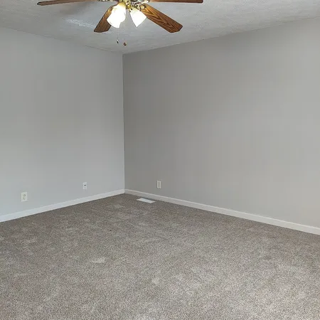 a bathroom with a sink and vanity