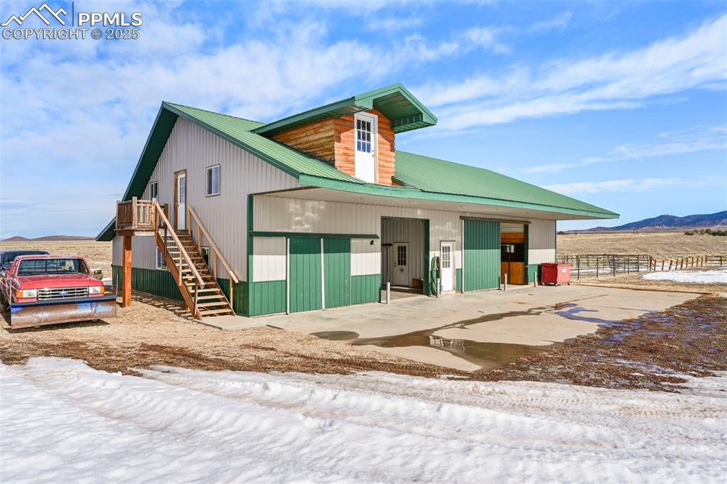 207 Howe Road Westcliffe, CO 81252 - Photo 34 of 48 a view of a house with a patio