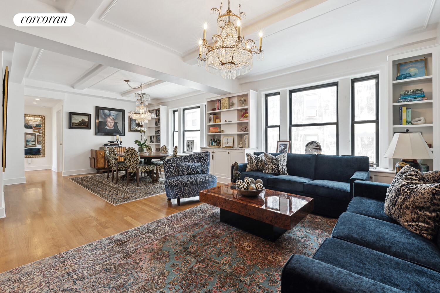 a living room with furniture or couch and a bookshelf