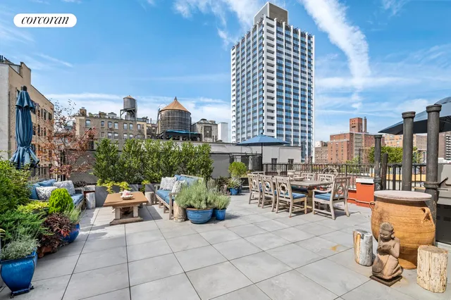 a view of a terrace with sitting area