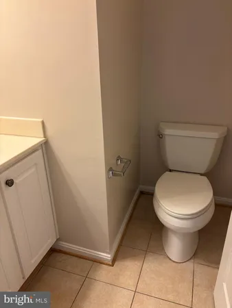 a bathroom with a toilet and a sink