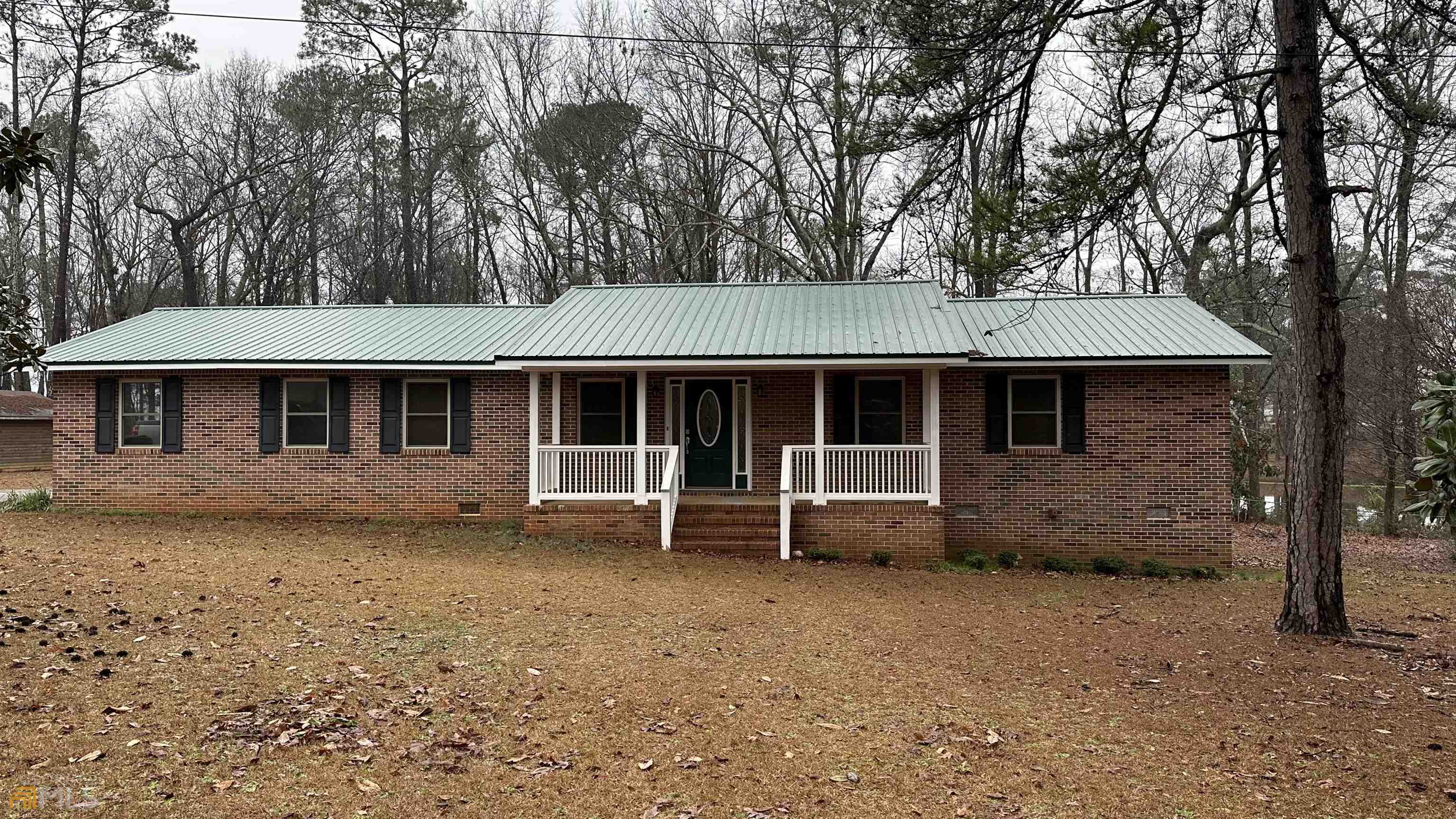 520 Honeysuckle Drive Thomaston, GA 30286 - Photo 1 of 1 a front view of a house with a garden