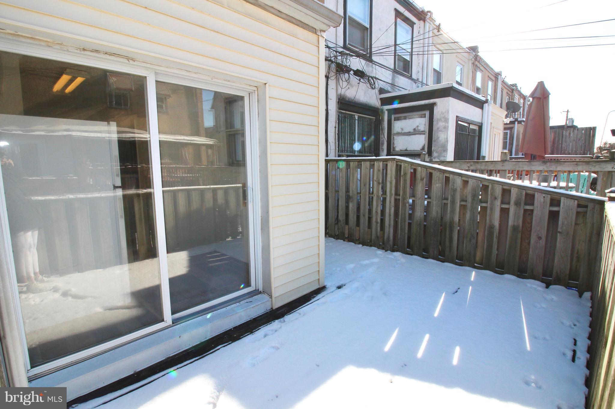 280 Sheffield Road Lansdowne, PA 19050 - Photo 9 of 14 large deck off the kitchen with sliders