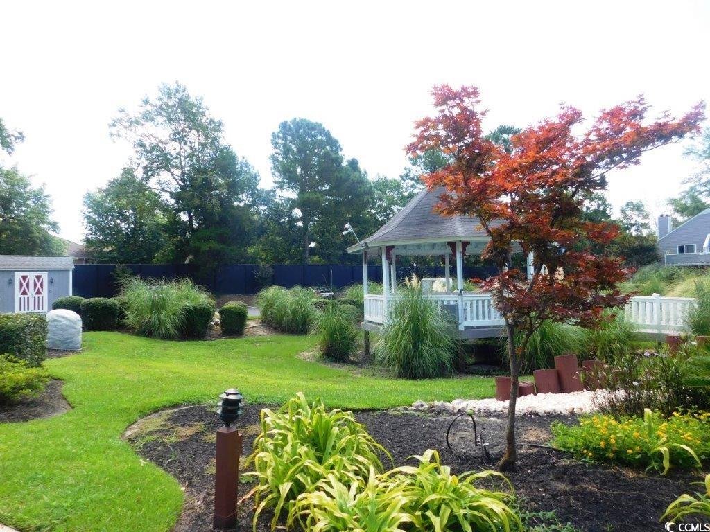 1202 Tiffany Lane, Unit D Myrtle Beach, SC 29577 - Photo 20 of 21 View of yard with a gazebo