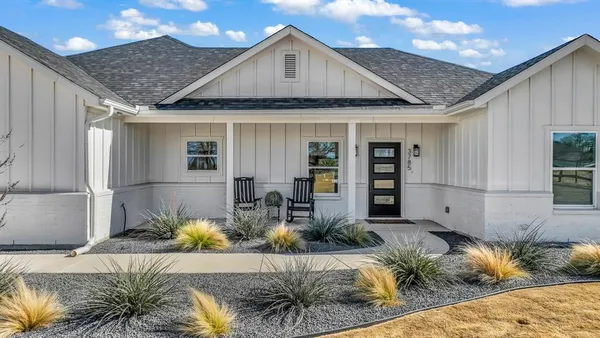 a house view with a outdoor space