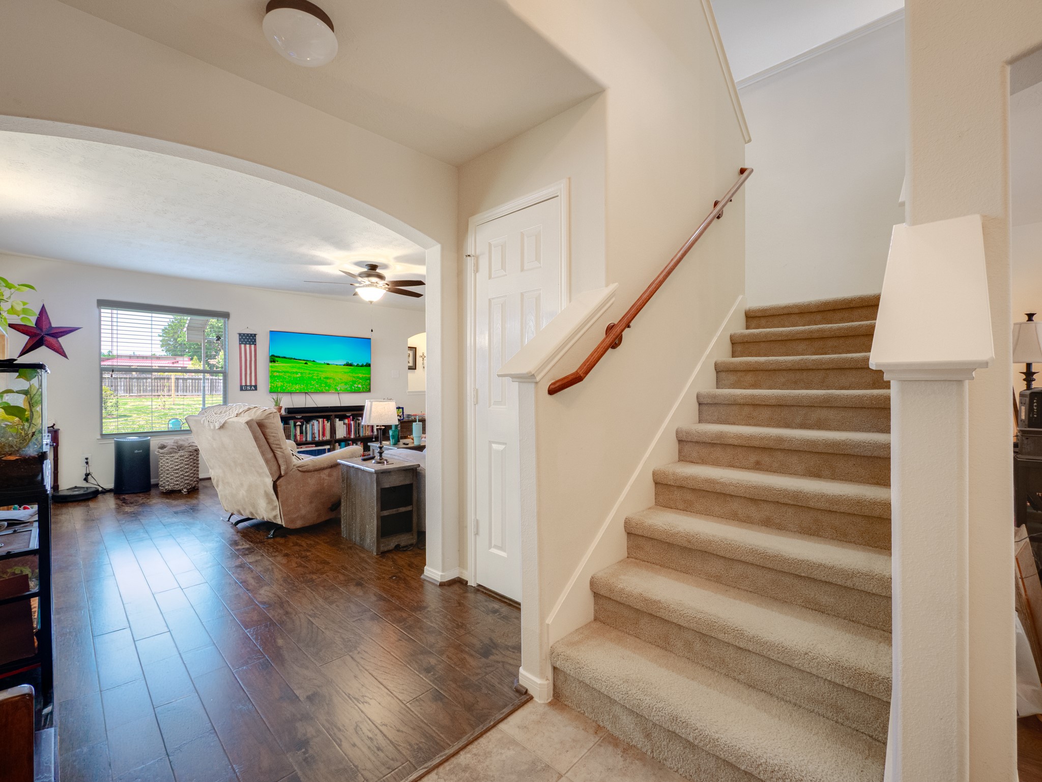 22106 Bridgestone Crossing Drive Spring, TX 77388 - Photo 8 of 26 Open view to the family room, and stairs leading to 3 bedrooms and gameroom
