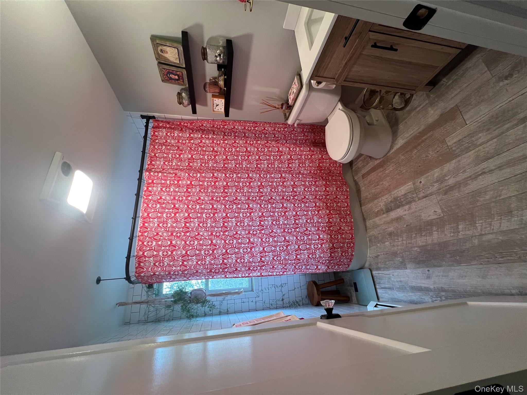 103 Filors Lane, Unit 101 Stony Point, NY 10980 - Photo 18 of 23 a bathroom with a toilet and a shower