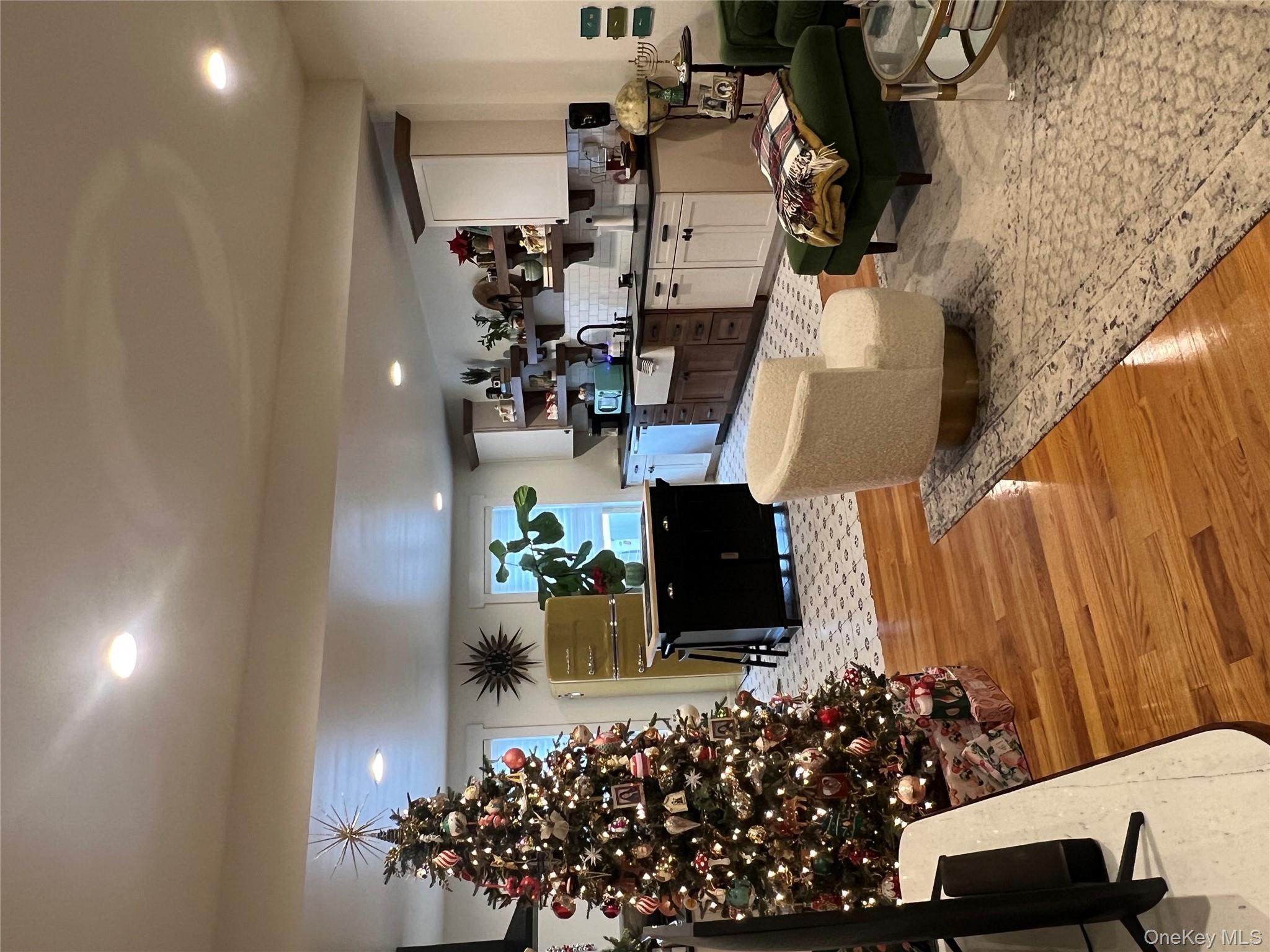 103 Filors Lane, Unit 101 Stony Point, NY 10980 - Photo 5 of 23 a living room with furniture and a fireplace