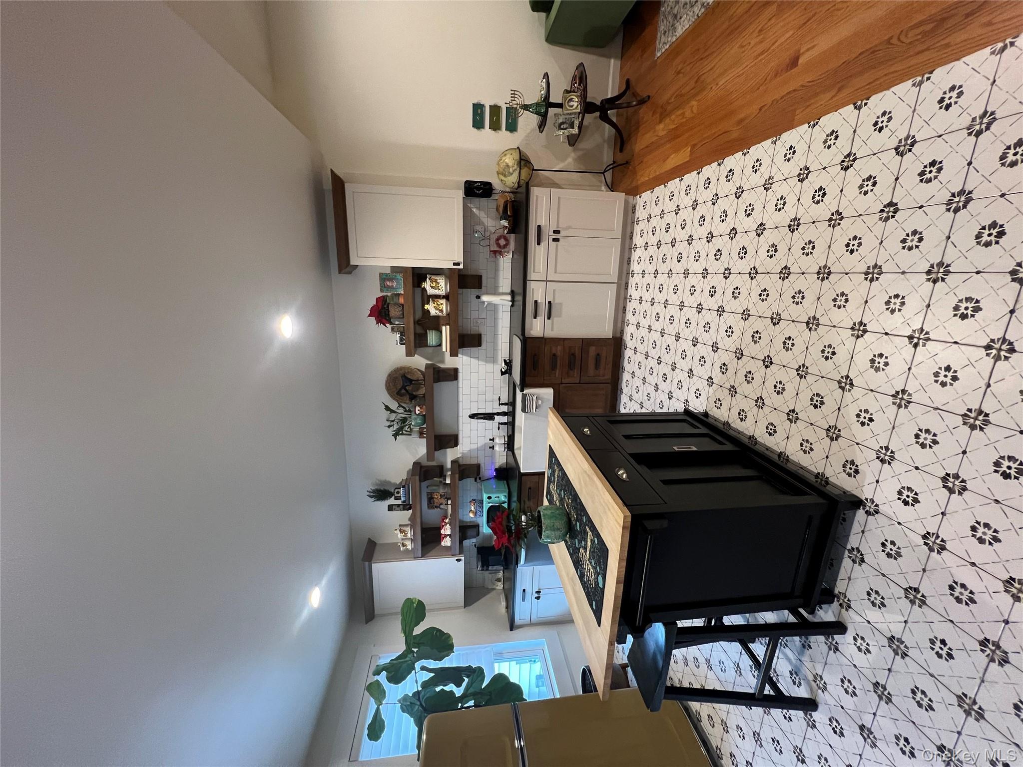 103 Filors Lane, Unit 101 Stony Point, NY 10980 - Photo 9 of 23 a kitchen with a sink and cabinets