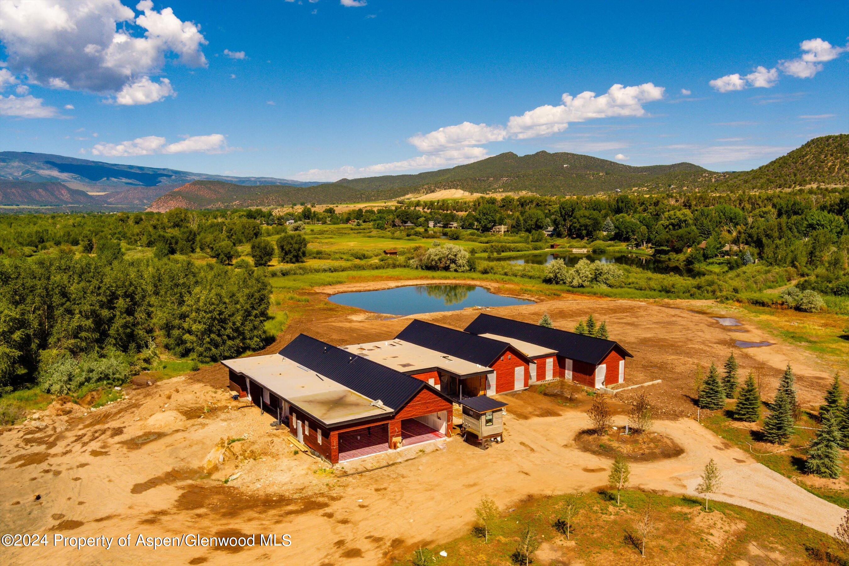34 St Finnbar Farm Road Carbondale, CO 81623 - Photo 2 of 22 swimming pool view with a lake view