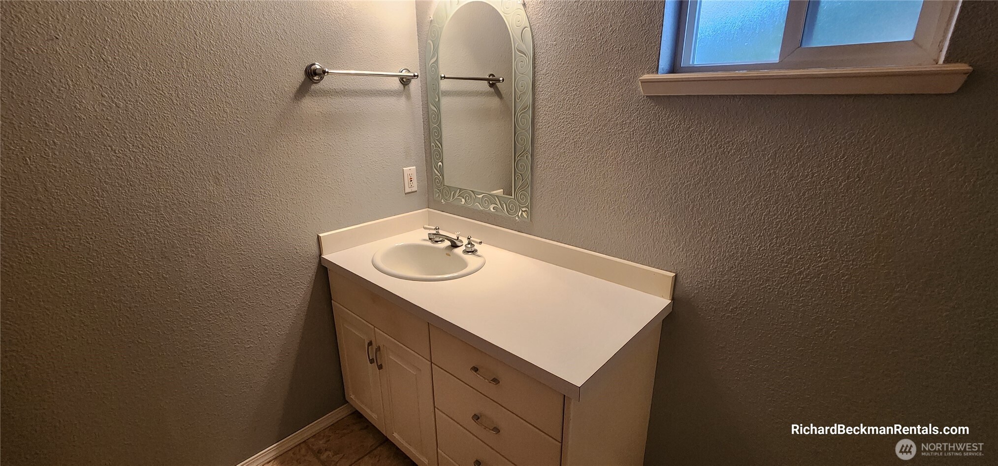701 East Rd Of Tralee Shelton, WA 98584 - Photo 16 of 20 a bathroom with a sink and a mirror
