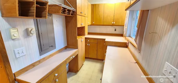 an aerial view of a house with yard swimming pool and outdoor seating