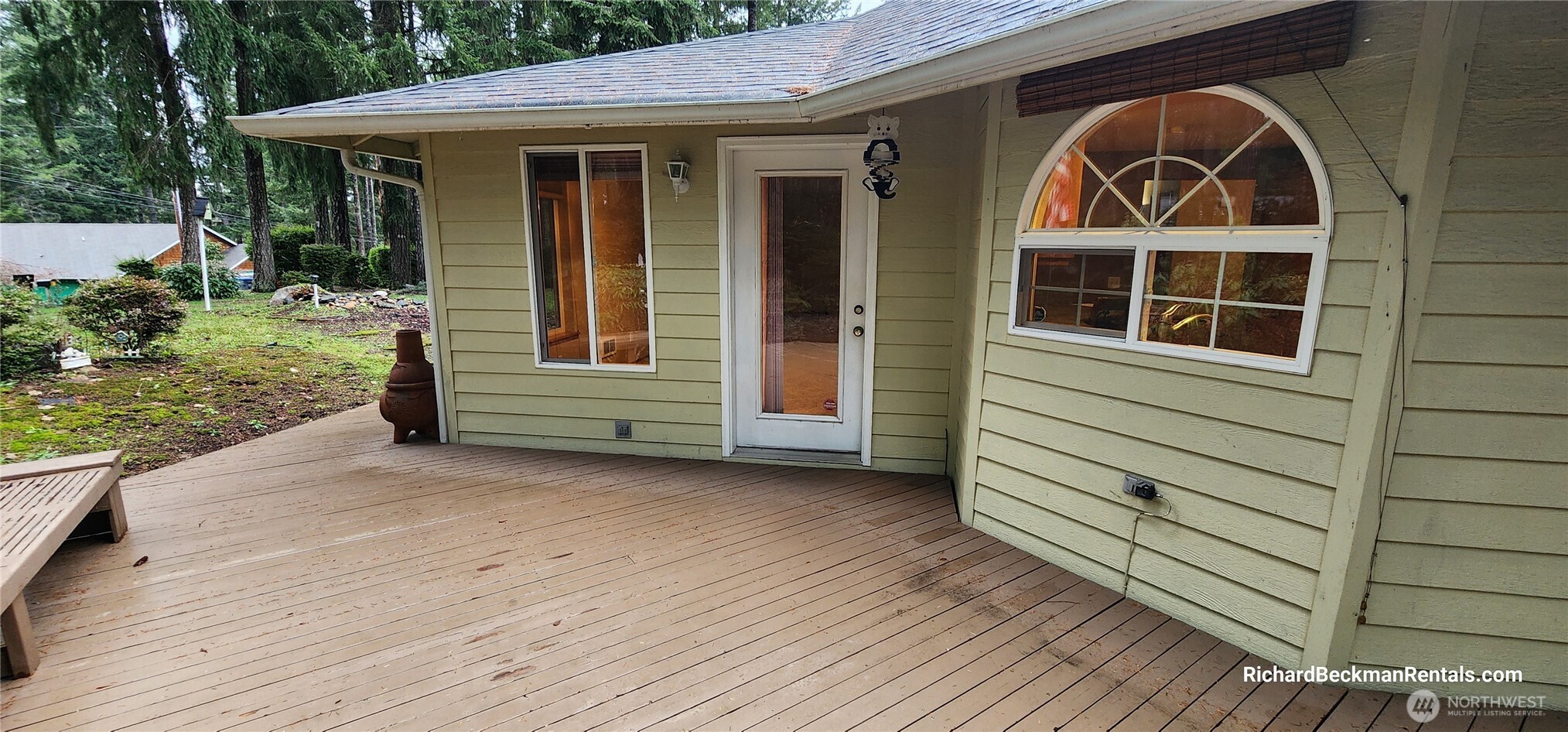 701 East Rd Of Tralee Shelton, WA 98584 - Photo 18 of 20 a view of house with wooden floor and a yard