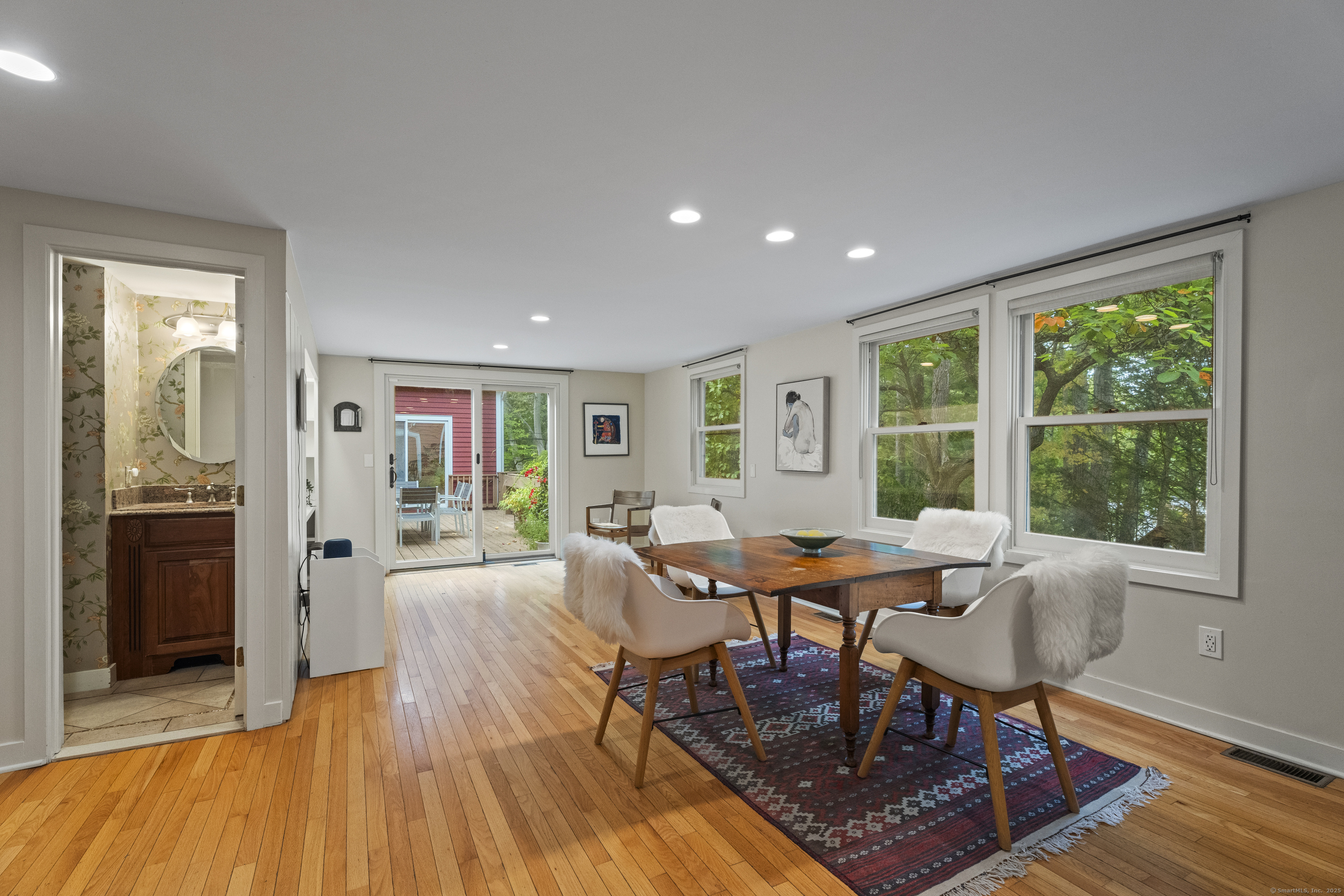 133 Blake Road Hamden, CT 06517 - Photo 13 of 40 a dining room with furniture and wooden floor